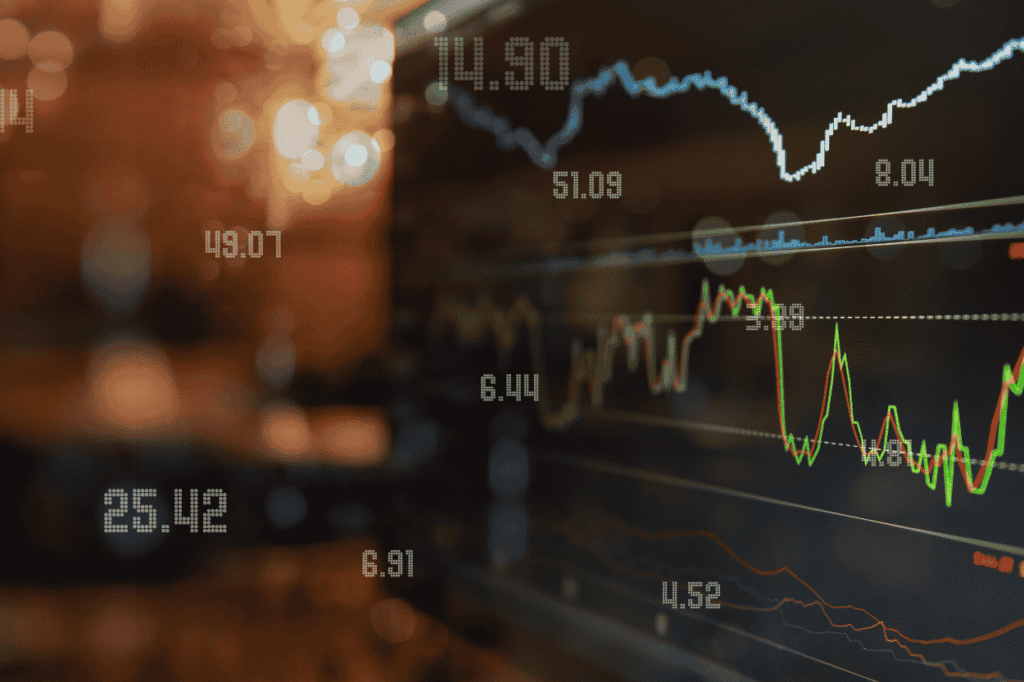 Stock market charts displayed over a city background